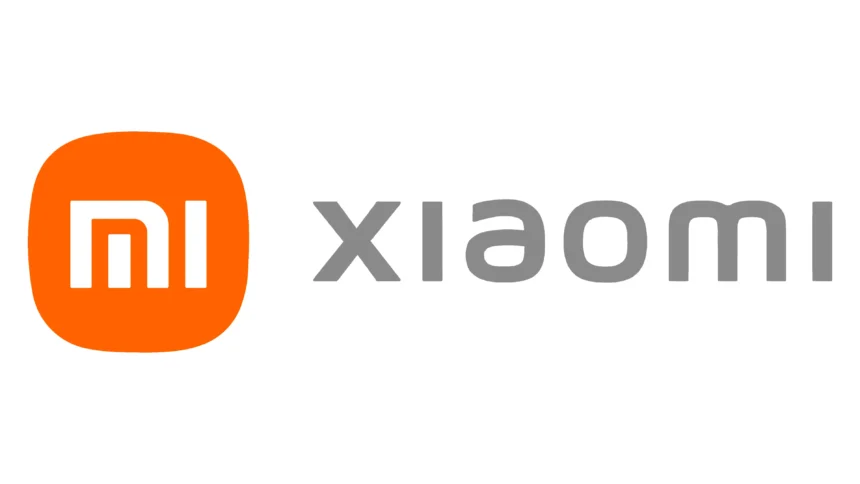 Logotipo oficial de Xiaomi con fondo negro, ícono naranja con las letras “Mi” en blanco y el nombre de la marca en gris.